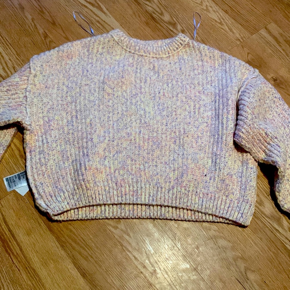 Divided size medium sweater worn one time